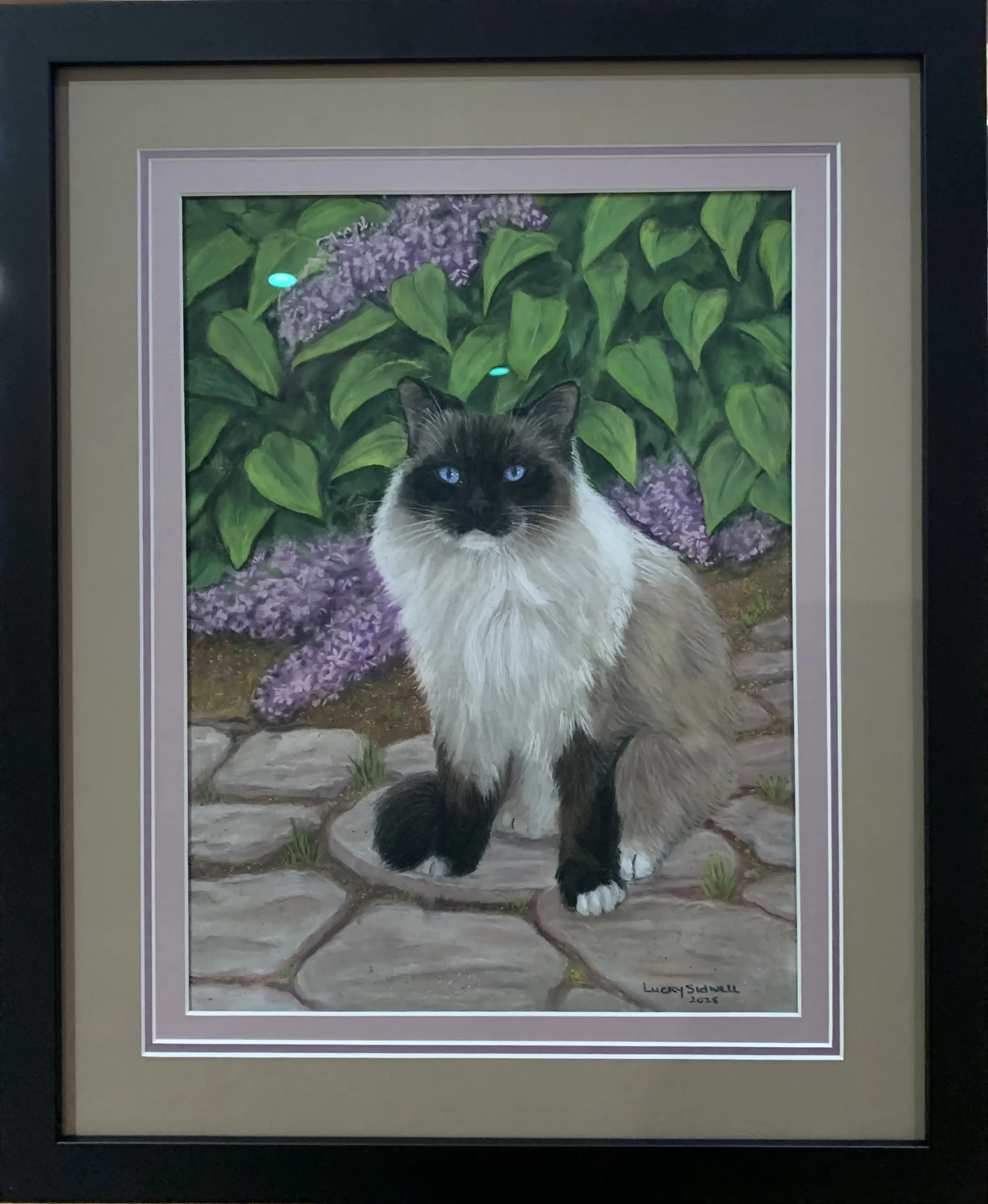 Framed cat painting with double mat
