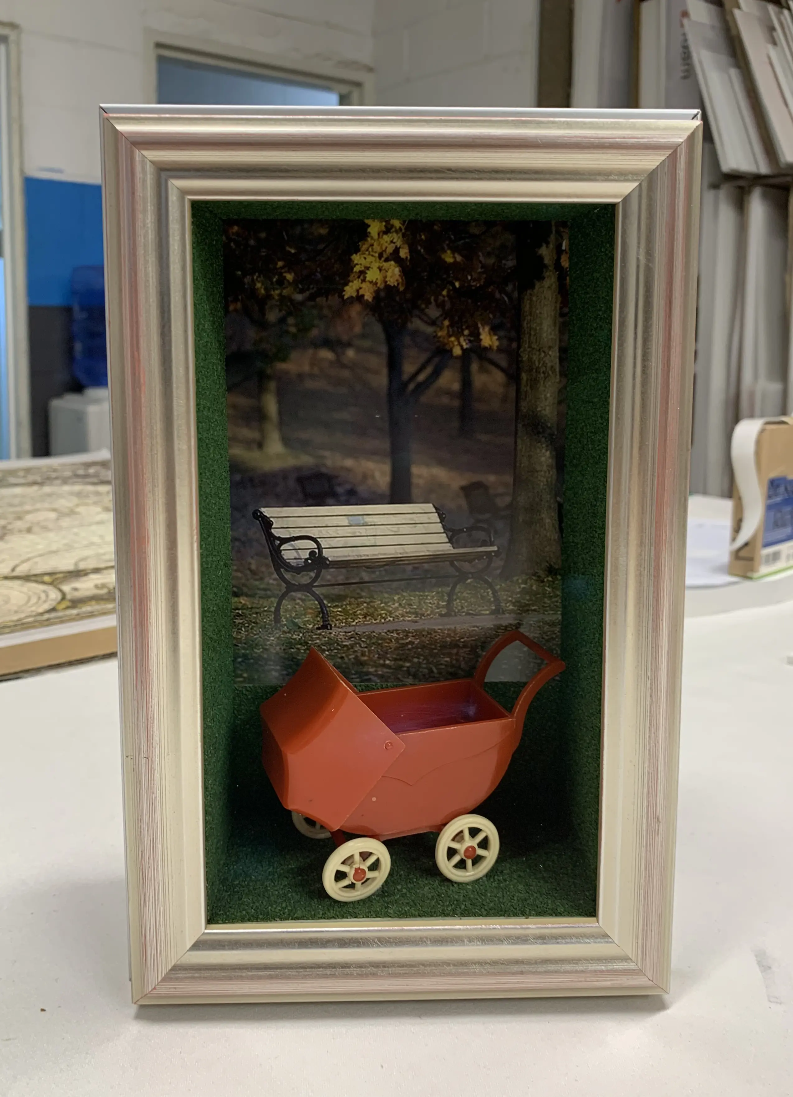 Custom shadow box with miniature pram